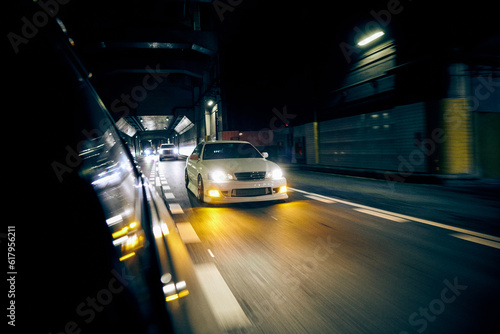 car in the city Tokyo at night