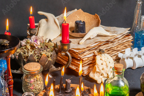 Spiritual occultism and magic chemistry background. Witchcraft potion vials or glass bottles with magic liquid ingredients. Alchemy and esoteric items for magik cult. Occult and esoteric concept.