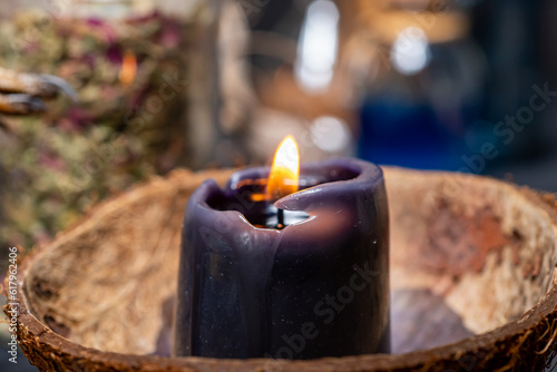 Bilde på lerret Witchcraft altar selective focus to details of candles light and magic tools or items