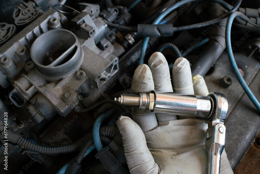 car maintenance, spark plug change operation of the internal combustion