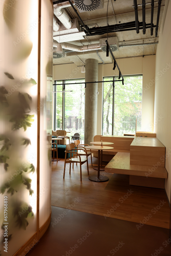 Fototapeta premium Modern cafe with stylish furniture. Interior design