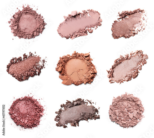 Foto Set of different crushed eye shadows on white background, top view