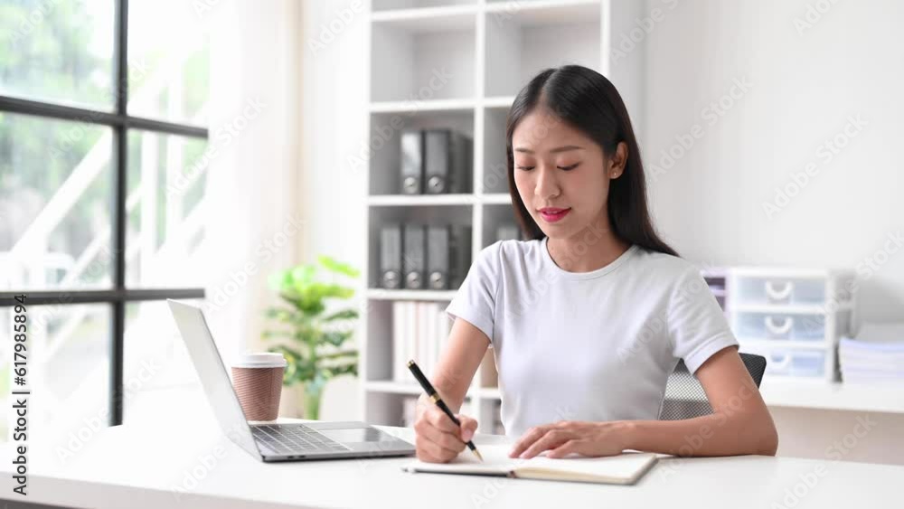 Business woman using tablet and laptop for doing math finance on an office desk, tax, report, accounting, statistics, and analytical research concept in office Business woman using tablet and laptop for doing math finance on an office desk, tax, report, accounting, statistics, and analytical research concept in office