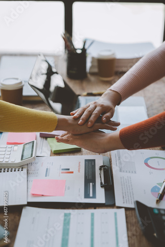 Fotografie Image of business women's hands putting together handshake show partner Power promise trust, work trust, respect, fight, touch stack fist bump to agree to work together