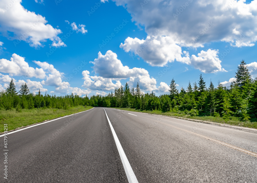 abstract empty road in summer, blue sky, white clouds, highway or speedway in rural countryside created with generative ai technology abstract empty road in summer, blue sky, white clouds, highway or speedway in rural countryside created with generative ai technology