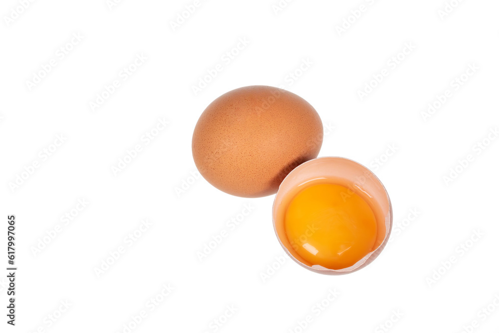 Yolk in an eggshell on a white background. Yolk in an eggshell on a white background.