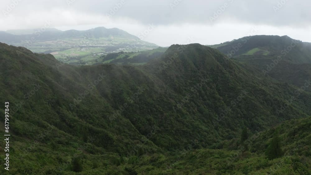 Aerial: Miradouro do Salto do Cavalo viewpoint to Azores Green Rolling hills Aerial: Miradouro do Salto do Cavalo viewpoint to Azores Green Rolling hills