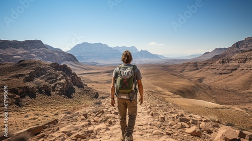 a man is walking in the desert