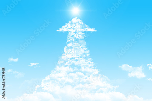 青空にかかる上昇矢印の雲