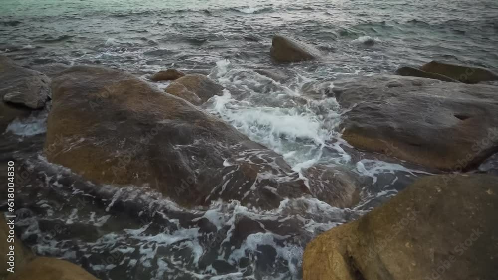 Majestic Evening Seascape: Dramatic Waves Collide with Island Rocks in Eastern Thailand at Sunset Majestic Evening Seascape: Dramatic Waves Collide with Island Rocks in Eastern Thailand at Sunset