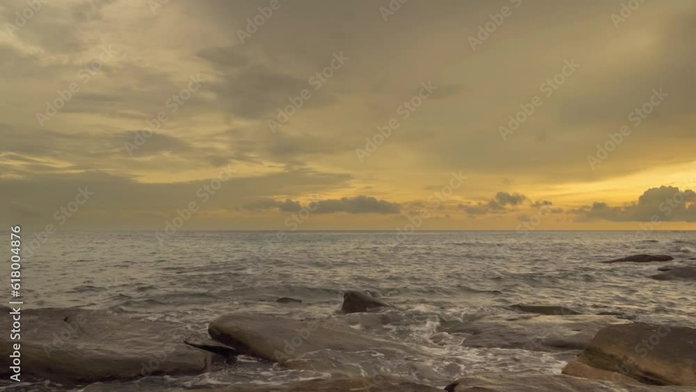 Majestic Evening Seascape: Dramatic Waves Collide with Island Rocks in Eastern Thailand at Sunset Majestic Evening Seascape: Dramatic Waves Collide with Island Rocks in Eastern Thailand at Sunset