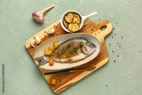 Bilde på lerret Plate with tasty grilled dorado fish on grey background
