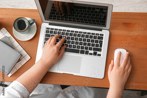 Female programmer using lap...