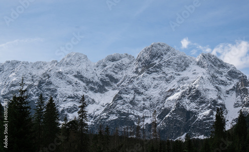 Snowy mountains, green forests In National park Zakopane Poland. Mountain nature landscape. Blue sky. Travel outdoors green tourism concept Naturecore. Hiking wellbeing  © anna.stasiia