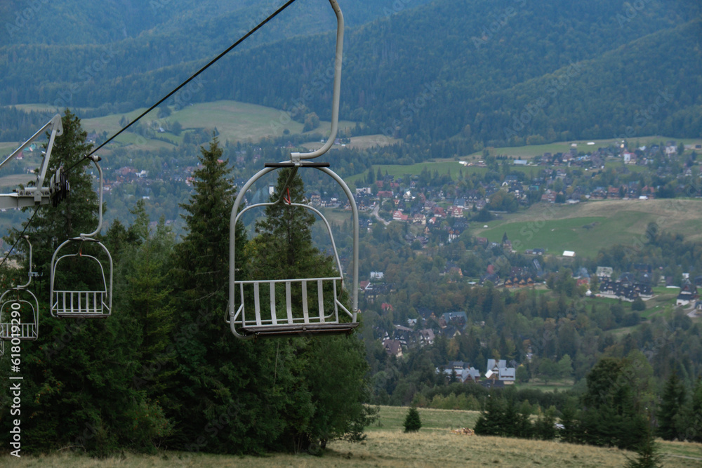Ski Lift snowy mountain autumn forest with chair lift At The Ski Resort