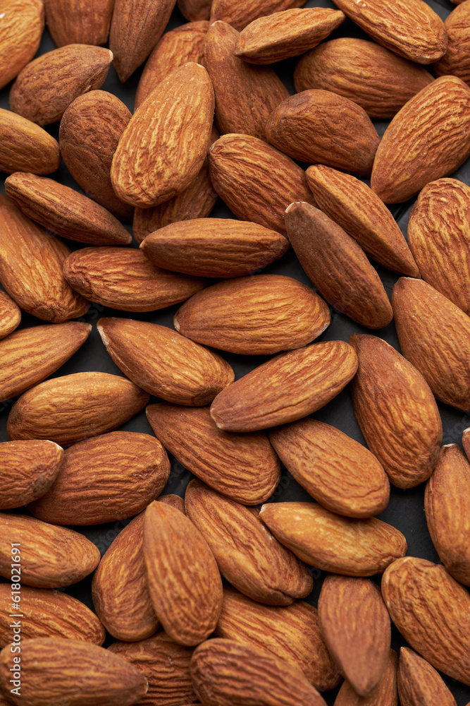 Whole shelled almond nuts kernels studio background Whole shelled almond nuts kernels studio background