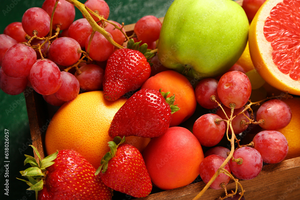 Wooden box with different fresh fruits, closeup Wooden box with different fresh fruits, closeup
