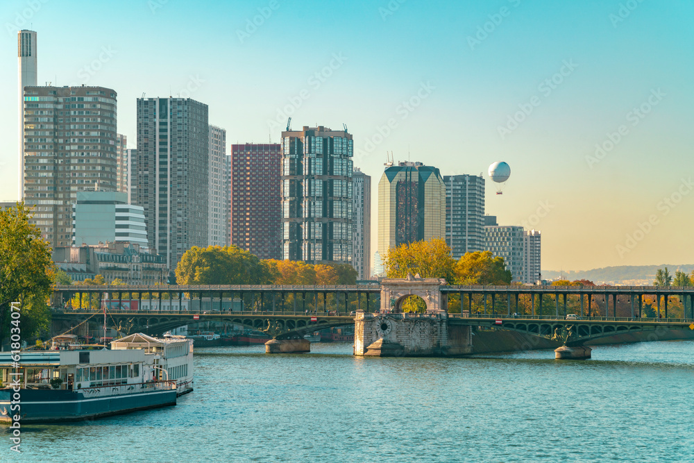 Fototapeta premium Pont de Bir Hakeim with business building in Grenelle, Paris, France
