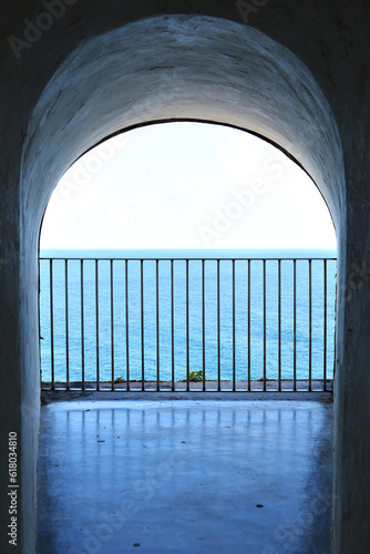 Archway overlooking the ocean from El Morro photo