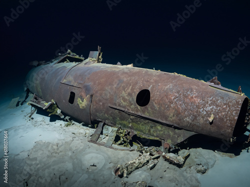 wreckage of sunken submarine at the bottom of the sea
