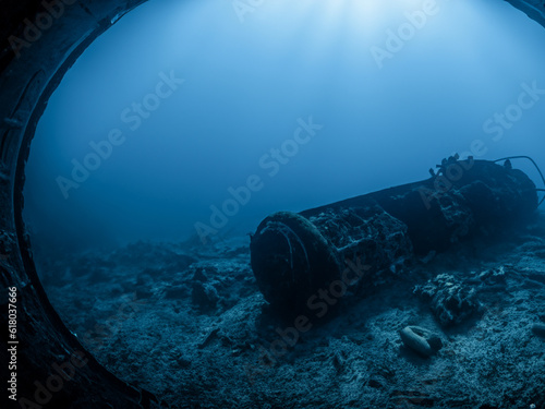 wreckage of sunken submarine at the bottom of the sea