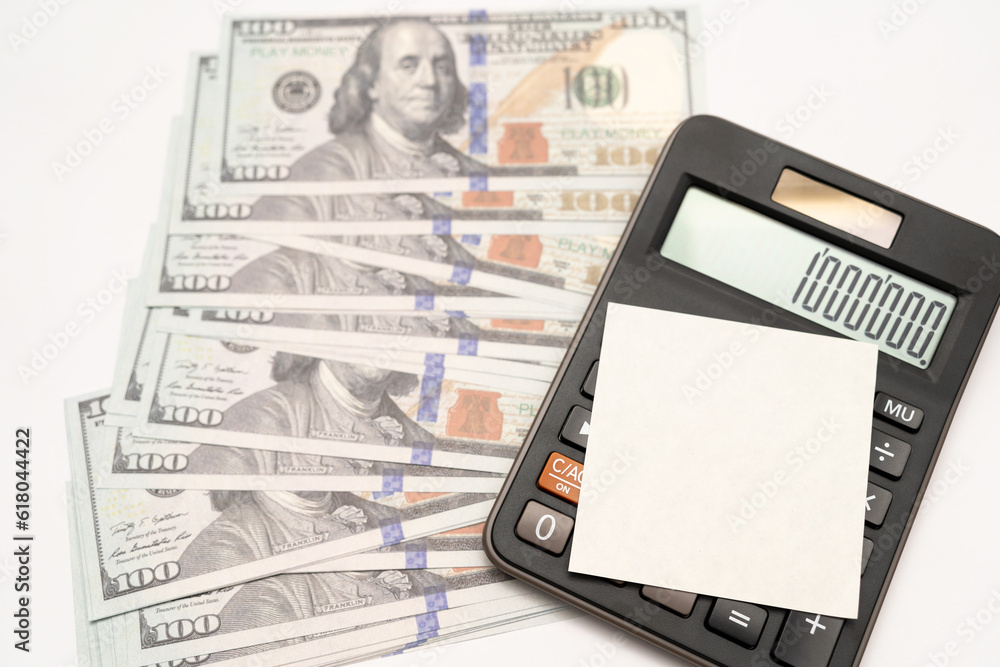 Dollars cash money and blank paper note for text. Investments Concept. Elderly Spouses Saving Money, Pension Plan. Retirement concept. Dollars cash money and blank paper note for text. Investments Concept. Elderly Spouses Saving Money, Pension Plan. Retirement concept.