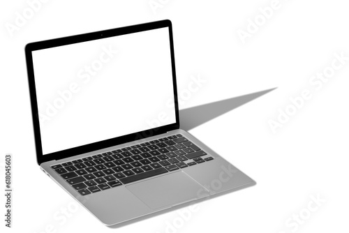 a modern laptop computer with hard shadow in png format