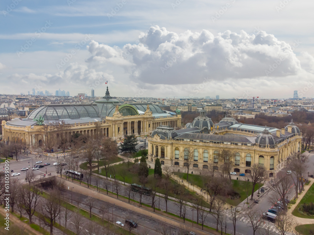 Aerial drone view of the Great Palace of the Elysian Fields (in French Grand Palais des les Champs-Élysées), is a historic site, exhibition hall and museum complex located at the Champs-Élysées