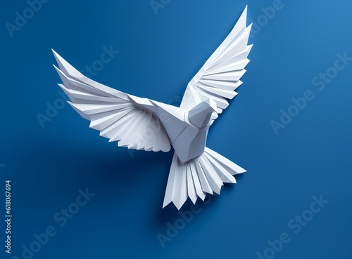 paper white dove on a bright blue background