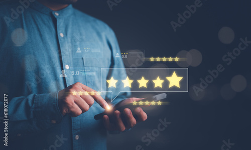 Customer review satisfaction feedback survey concept. User give rating to service excellent experience on smartphone application, Client evaluate quality of service reputation ranking of business.