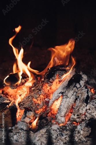 Closeup shot of a burning fire in a fireplace.