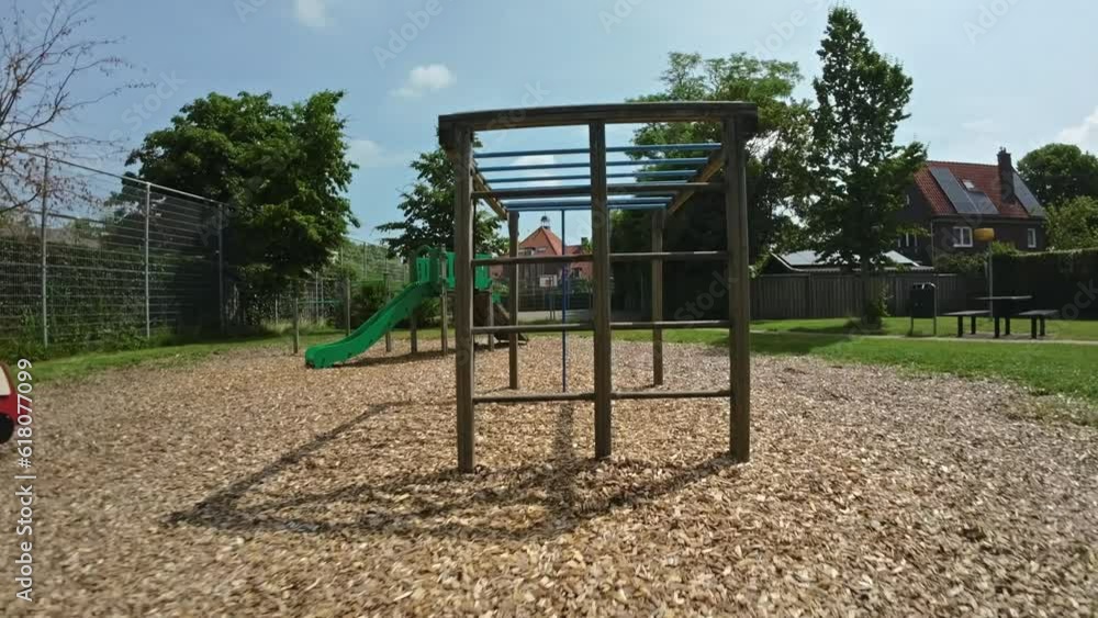 FPV drone flying through obstacles in a children's playground. FPV drone flying through obstacles in a children's playground.