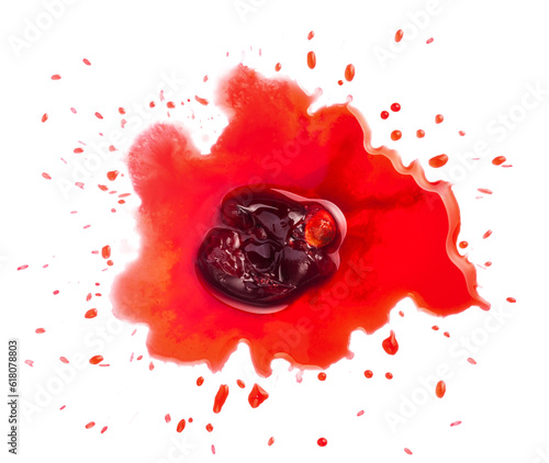 Squashed ripe sour cherry in the puddle of red juice isolated on white