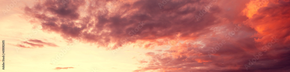 Colorful cloudy sky over the sea at sunset. Gradient color. Sky texture. Abstract nature background. Horizontal banner Colorful cloudy sky over the sea at sunset. Gradient color. Sky texture. Abstract nature background. Horizontal banner