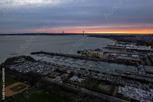 Aerial view over the industrial area on the shores of Gravesend Bay, at sunset in Brooklyn, New York