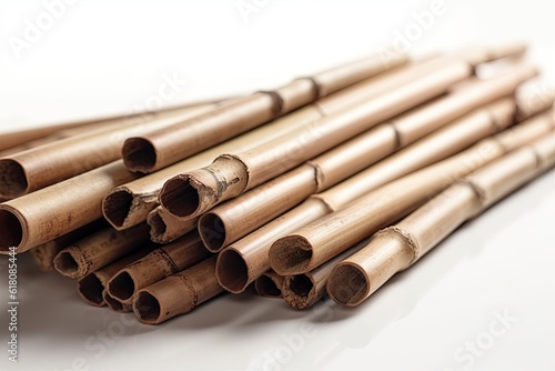 Dry bamboo sticks isolated on white background, close-up. photo