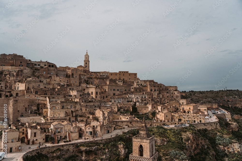 Scenic view of the Sassi di Matera in Italy, with a cloudy sky in the background