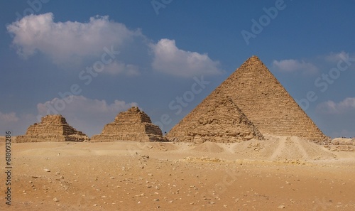 Stunning view of the pyramids of Giza under a cloudy sky
