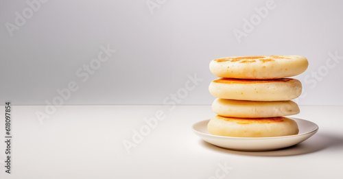 Delicious arepas stack isolated on white background, copy space, place for text photo