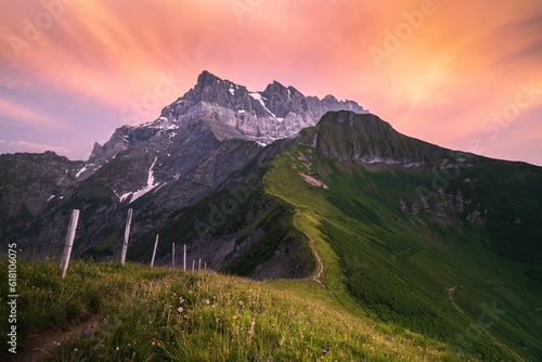 Summer sunset on a mountain ridge leading to the Dents du Midi range