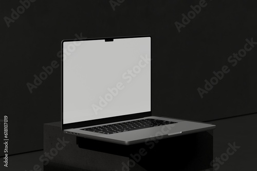 Laptop on dark block (ID: 618107019)