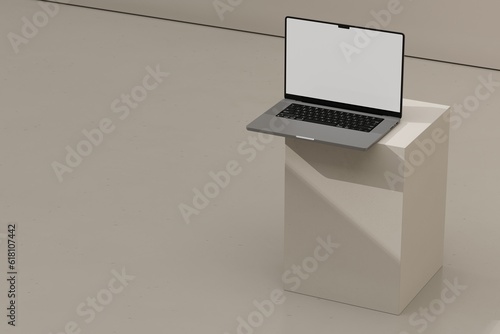 Laptop on beige block (ID: 618107442)