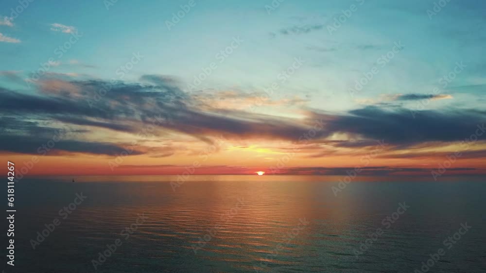 Timelapse View of the Baltic Sea at Sunset, Pavilosta, Latvia. Beautiful Golden Sunset Over the Beach Seascape. Glittering Sunlight Reflection. The Baltic Sea at the Mouth of Saka River in Courland Timelapse View of the Baltic Sea at Sunset, Pavilosta, Latvia. Beautiful Golden Sunset Over the Beach Seascape. Glittering Sunlight Reflection. The Baltic Sea at the Mouth of Saka River in Courland