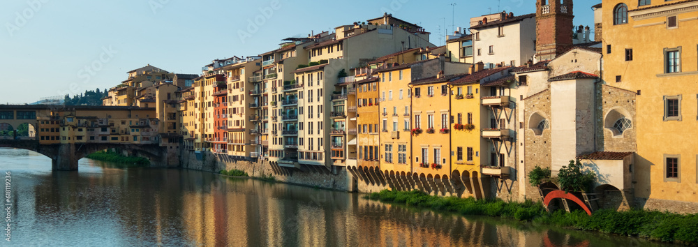 Panoramic of colourful houses near the Ponte Vecchio in Florence.  Italy Travel. European Travel Destination. Historic Architecture.