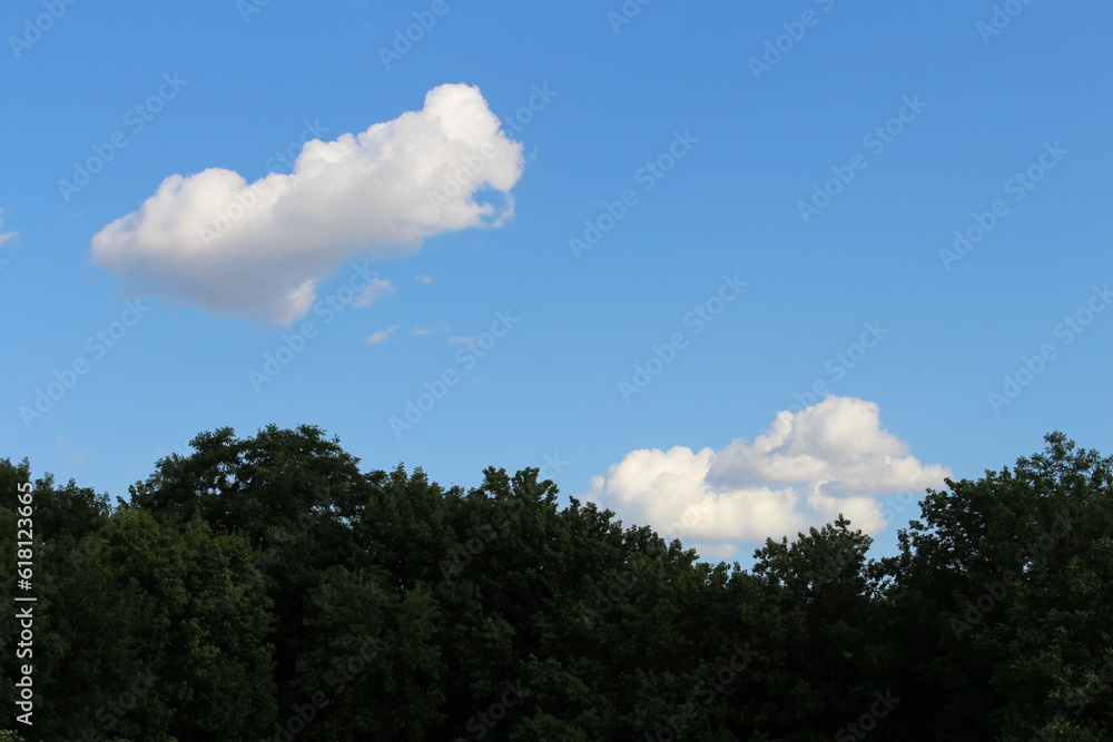 A blue sky with white clouds A blue sky with white clouds