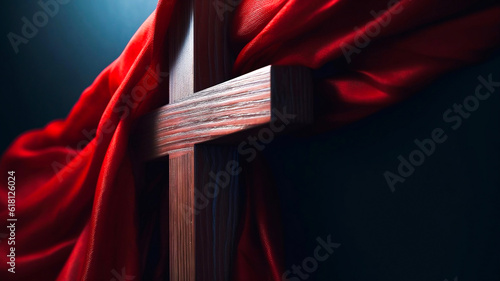 Wooden Cross of Jesus covered with red shawl. Lent season and Religion concept photo