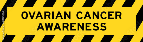 Yellow and black color with line striped label banner with word ovarian cancer awareness