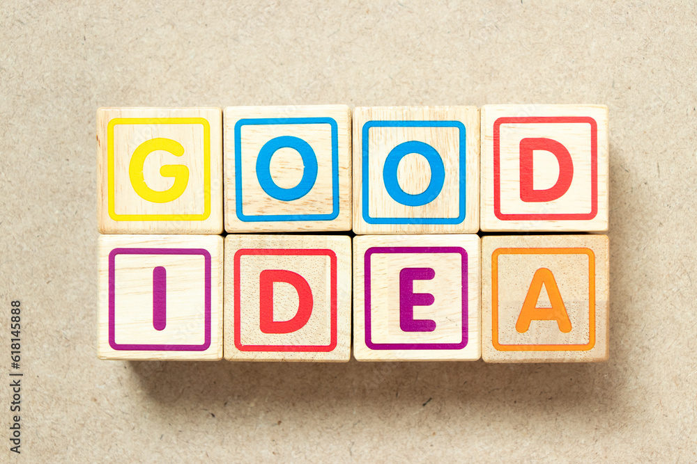 Wooden alphabet letter block in word good idea on wood background Wooden alphabet letter block in word good idea on wood background
