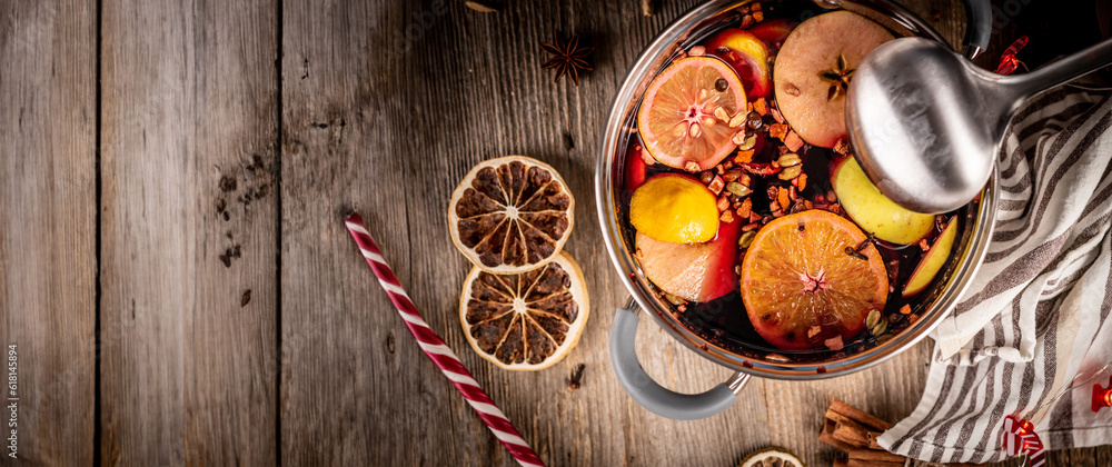 Pot with wine and spicy fruits