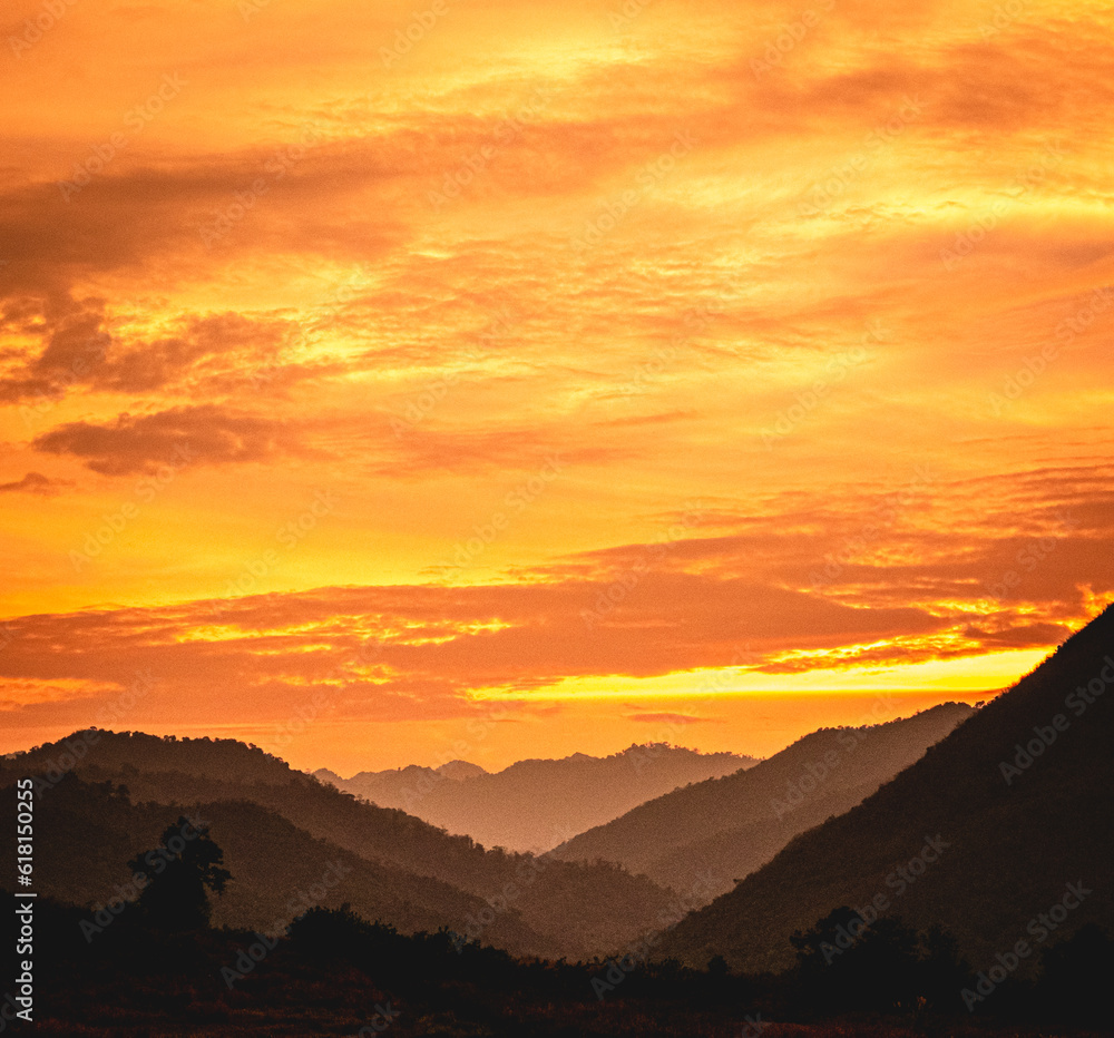 Sunset Over Mountain Ranges: A Serene and Breathtaking View